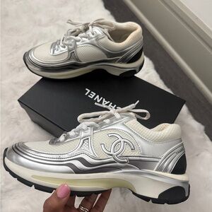 CHANEL Women's Sneakers in White and Silver